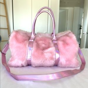 Pink iridescent furry Dollskill duffel bag
